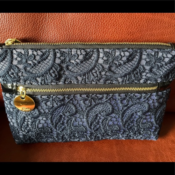 Handbags - SOLD! Never used. Clutch.Navy blue with a gold zipper.